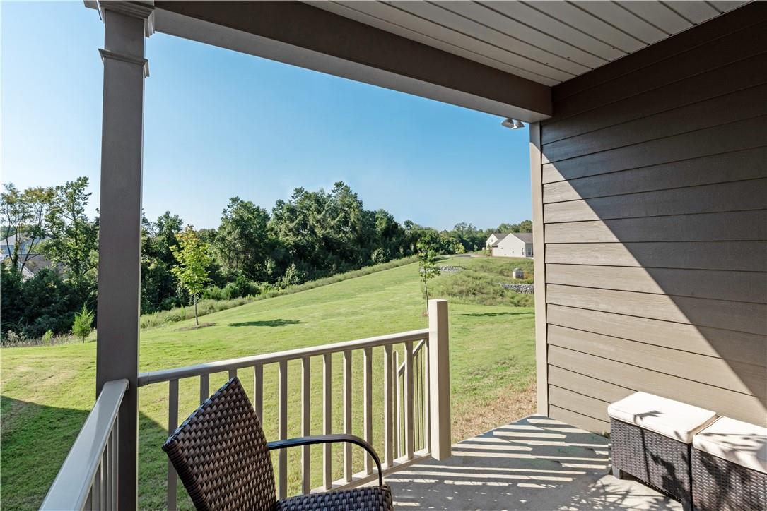 5292 Sweet Fig Way Fort Mill, SC 29715 - Photo 26 of 36 a view of a balcony with chair and floor to ceiling window