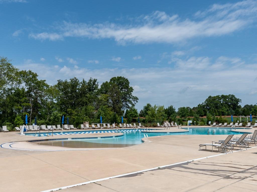 5292 Sweet Fig Way Fort Mill, SC 29715 - Photo 33 of 36 a view of a swimming pool and a yard