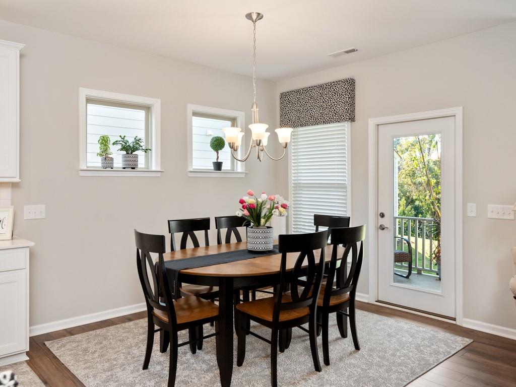 5292 Sweet Fig Way Fort Mill, SC 29715 - Photo 7 of 36 a view of a dining room with furniture and window