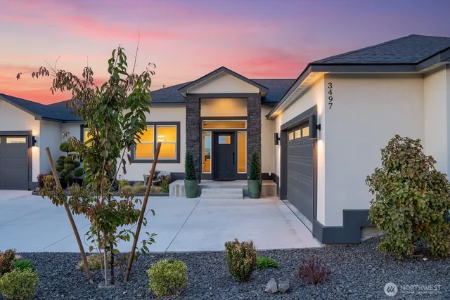 a front view of a house with patio