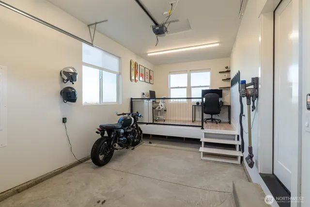 a view of a room with window and workspace