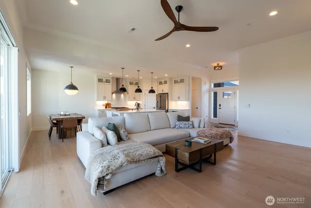 a living room with furniture and a table