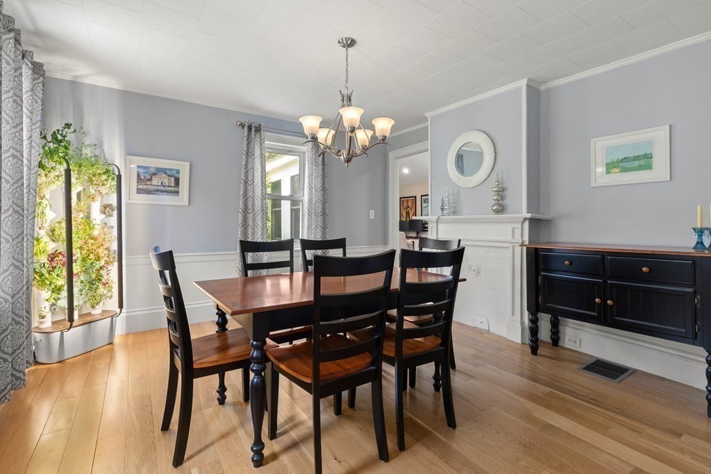 38 Elm Street Georgetown, MA 01833 - Photo 11 of 41 a view of a dining room with furniture and window