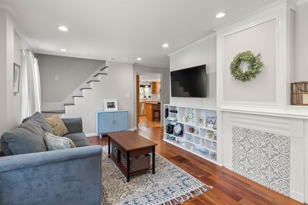 38 Elm Street Georgetown, MA 01833 - Photo 13 of 41 a living room with furniture and a flat screen tv