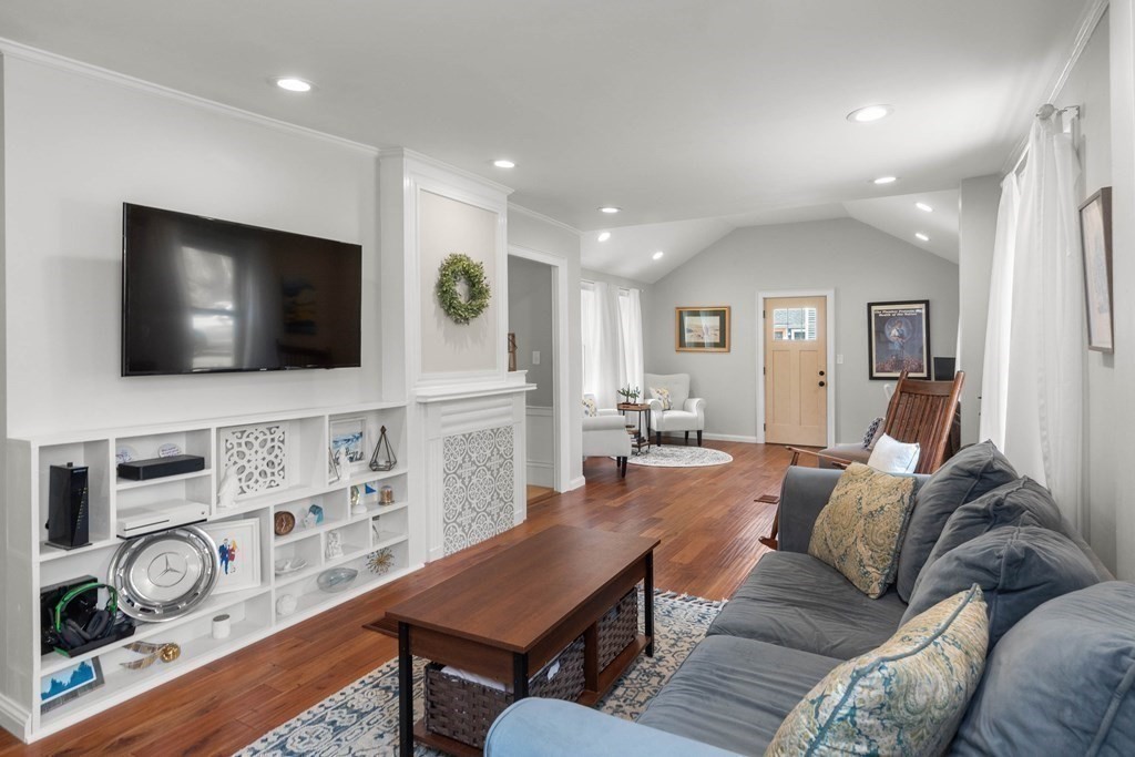 38 Elm Street Georgetown, MA 01833 - Photo 16 of 41 a living room with furniture and a flat screen tv