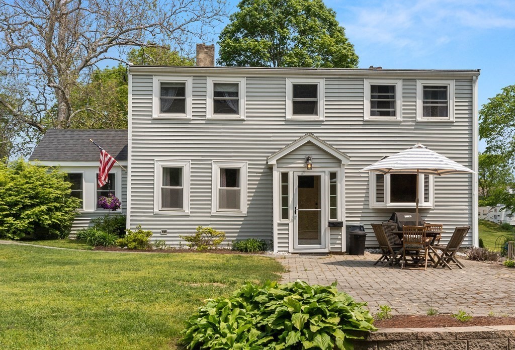 38 Elm Street Georgetown, MA 01833 - Photo 29 of 41 a view of a house with a yard and chairs