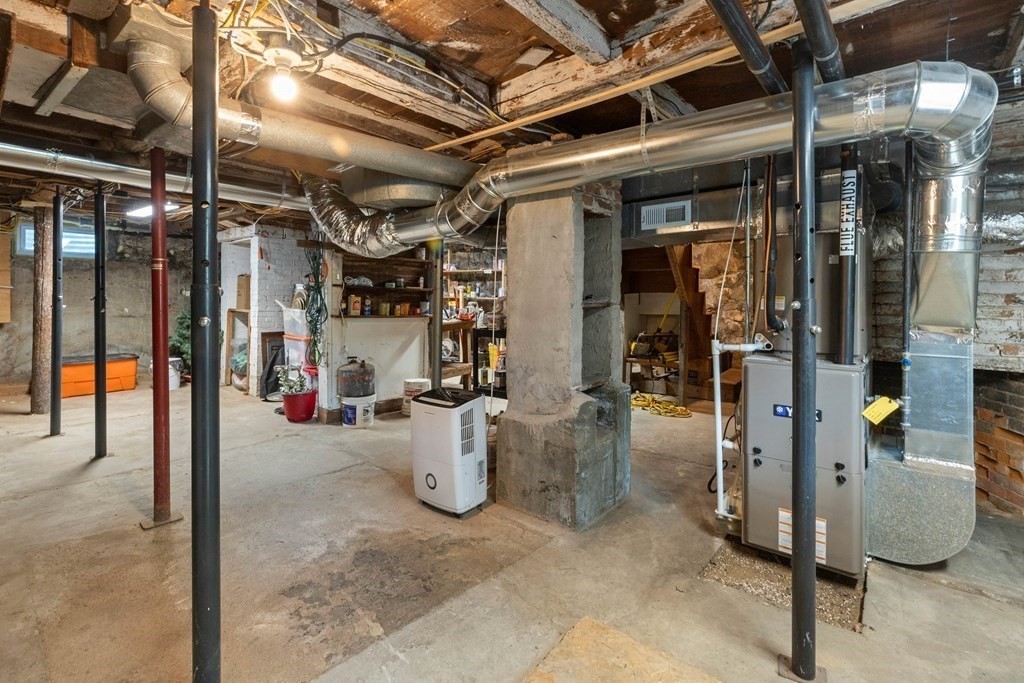 38 Elm Street Georgetown, MA 01833 - Photo 37 of 41 a view of a porch with a table and chairs