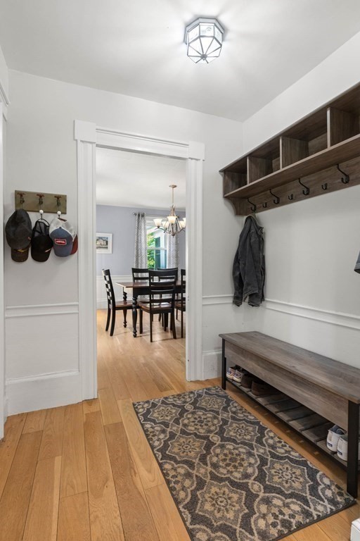 38 Elm Street Georgetown, MA 01833 - Photo 5 of 41 a view of a hardwood floor and a livingroom with wooden floor