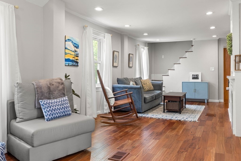 38 Elm Street Georgetown, MA 01833 - Photo 9 of 41 a living room with furniture and wooden floor