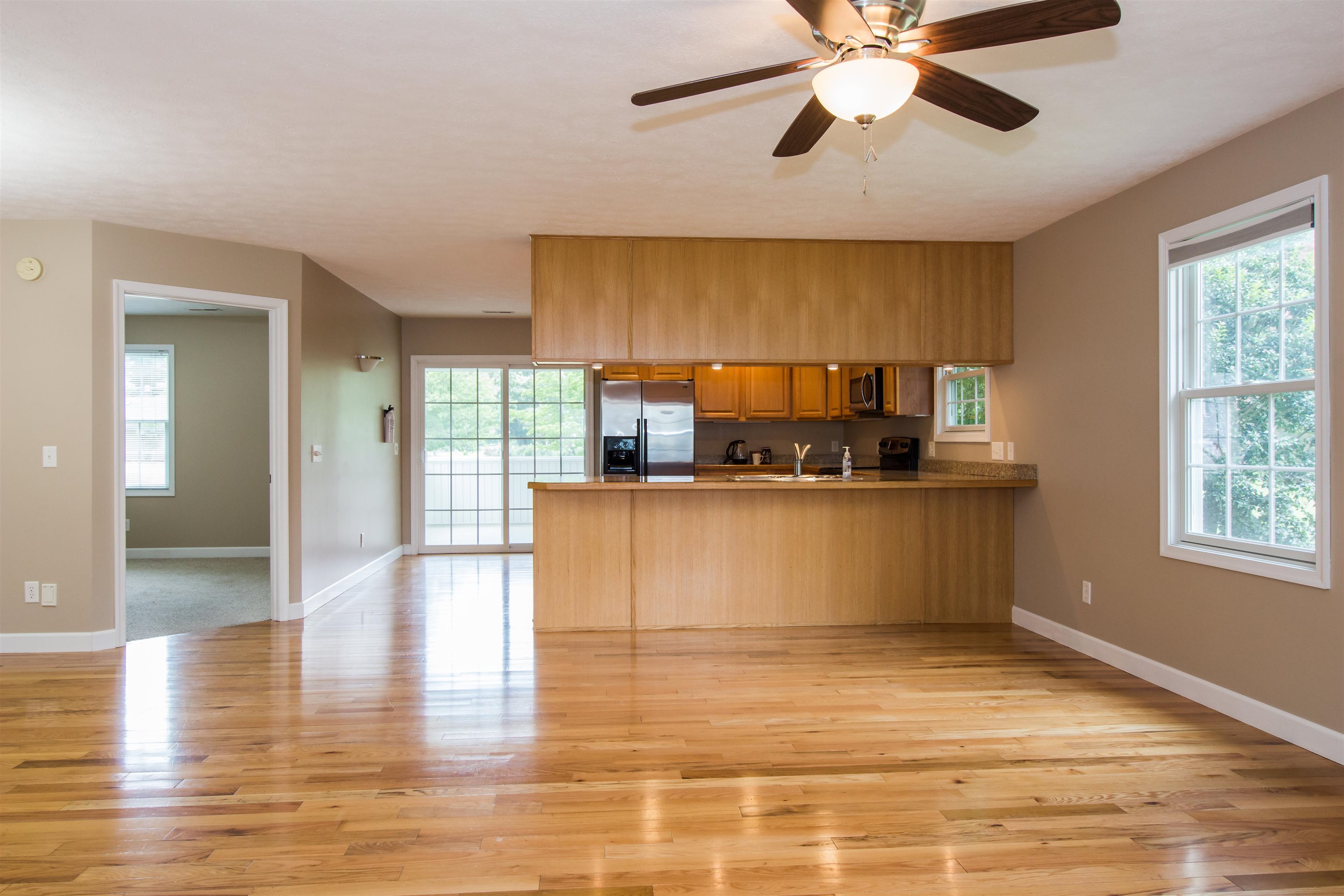 302 A North River Road Bridgewater, VA 22812 - Photo 14 of 24 a living room with stainless steel appliances kitchen island granite countertop a sink a stove and a wooden floors