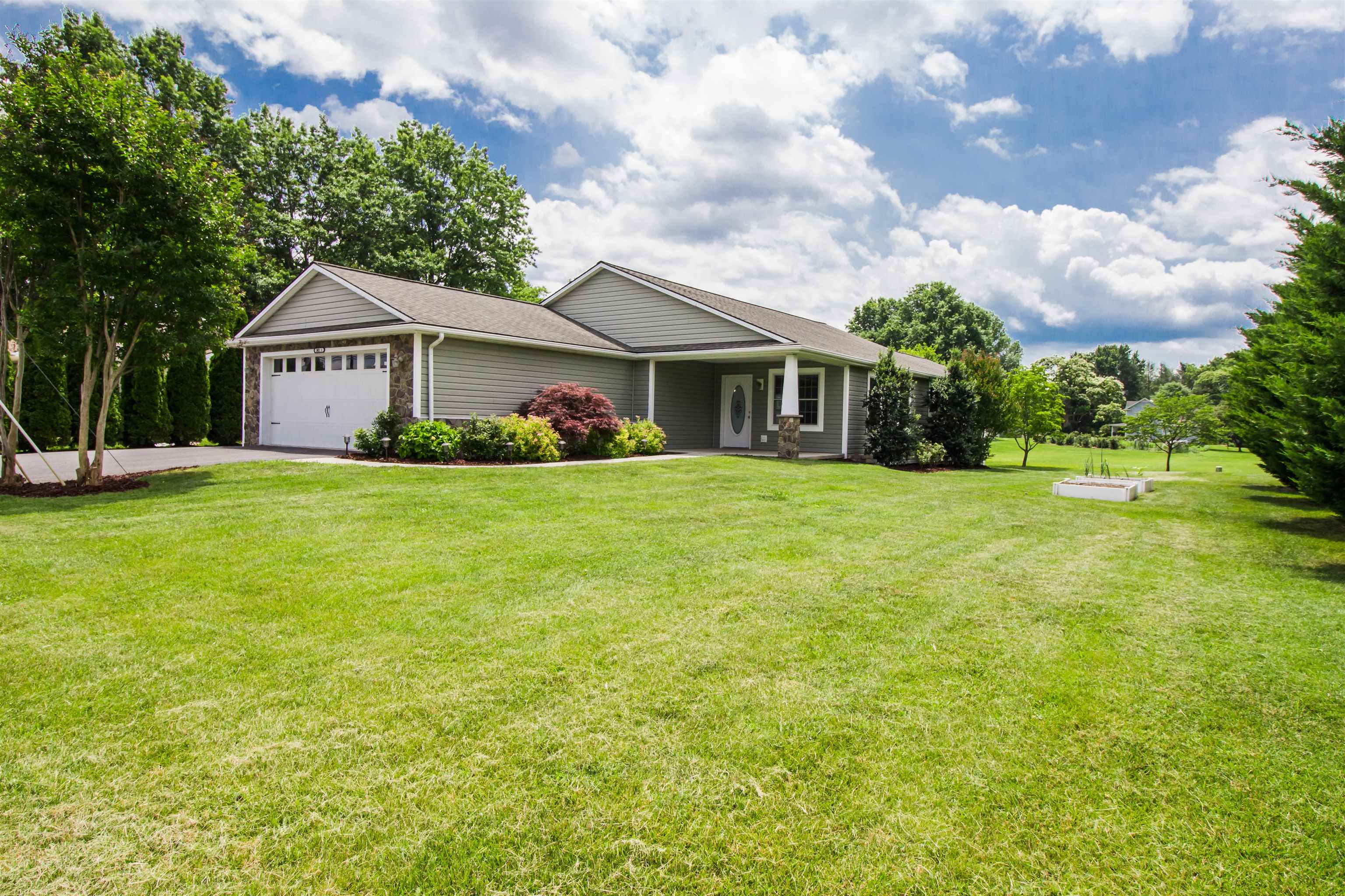 302 A North River Road Bridgewater, VA 22812 - Photo 3 of 24 a view of a house with a big yard and large trees