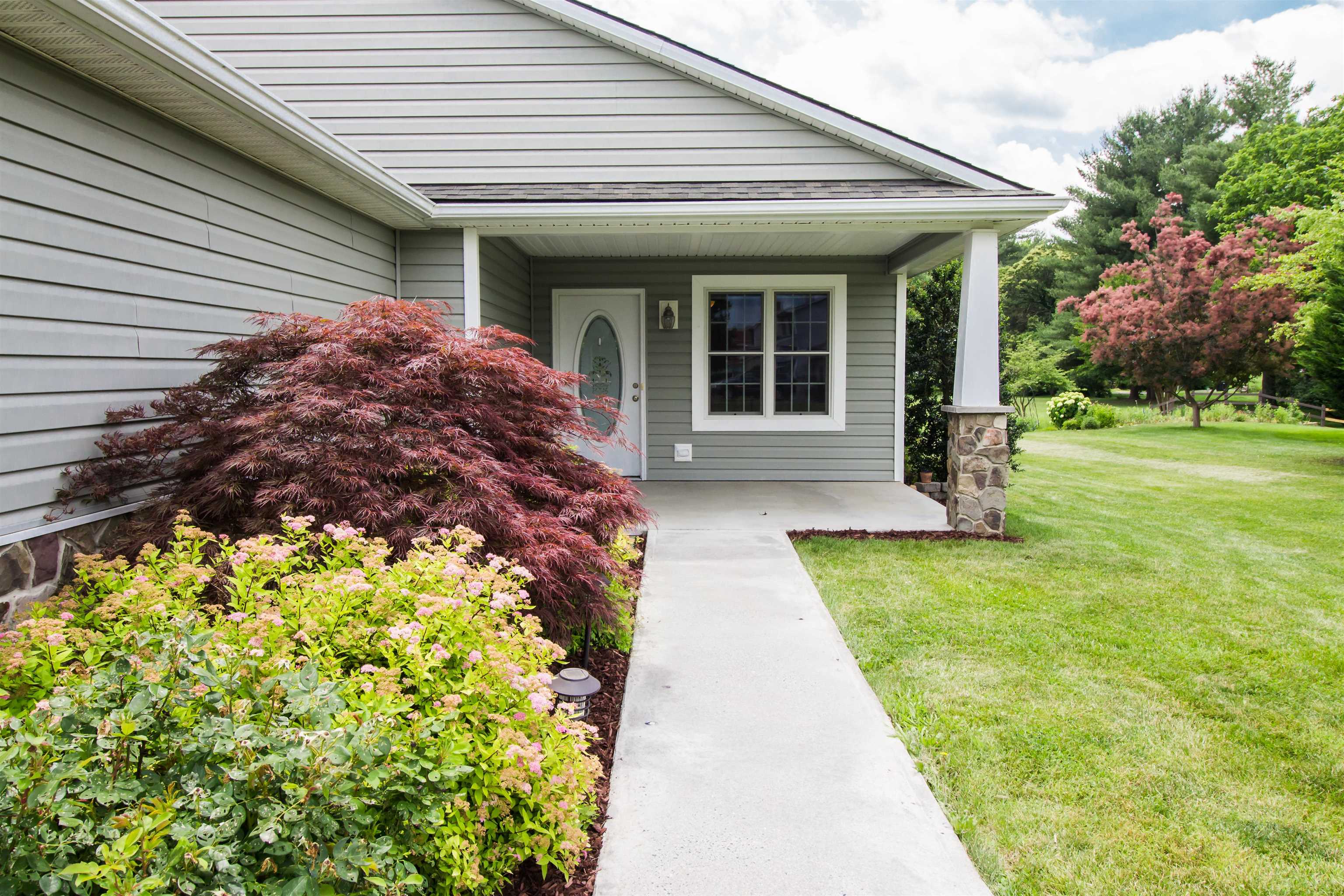 302 A North River Road Bridgewater, VA 22812 - Photo 7 of 24 a front view of a house with a garden