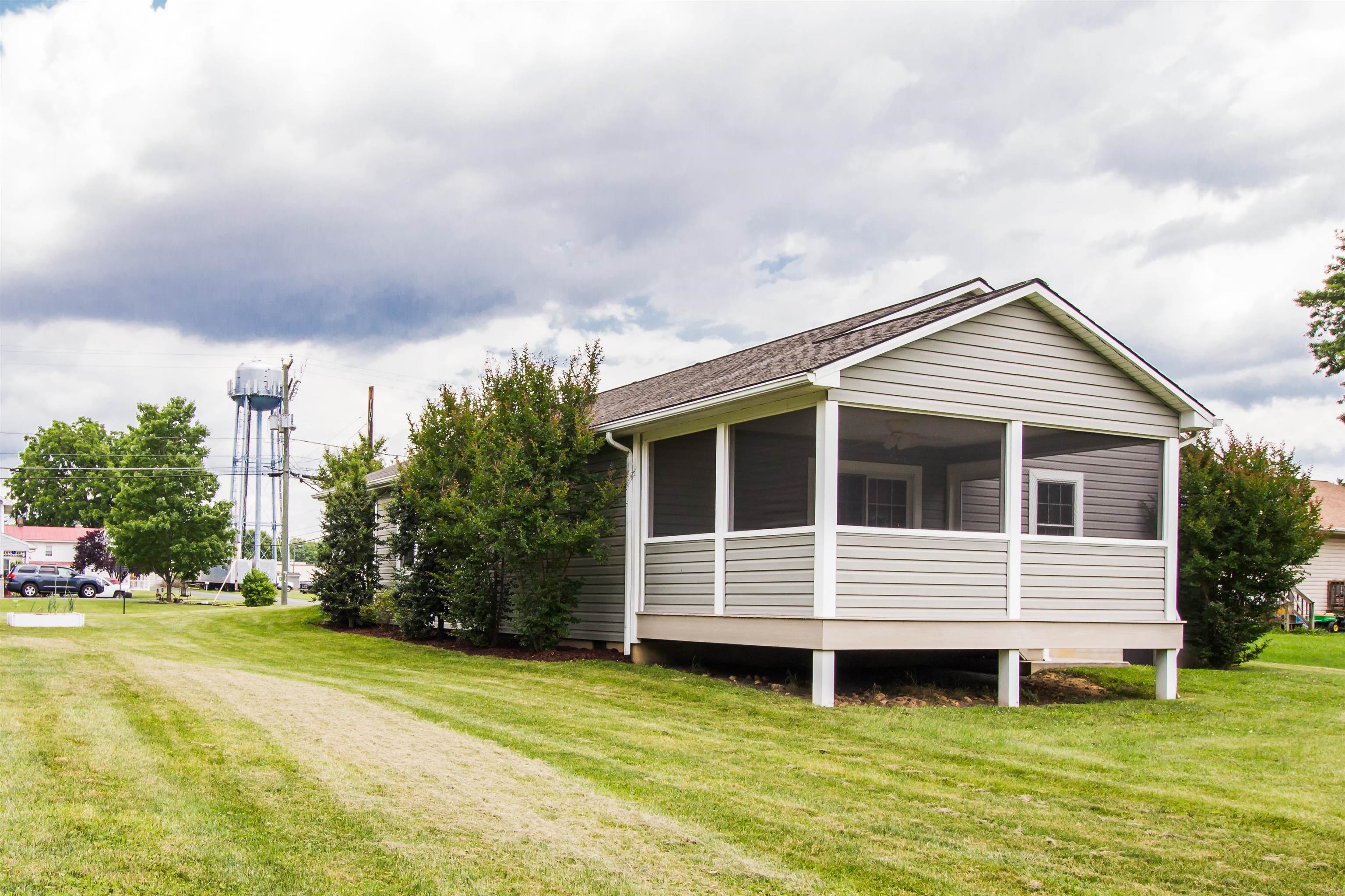 302 A North River Road Bridgewater, VA 22812 - Photo 9 of 24 a front view of a house with a yard