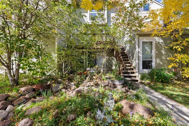 view of a house with a tree
