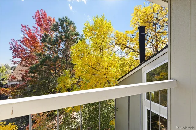 an aerial view of residential house with outdoor space and swimming pool
