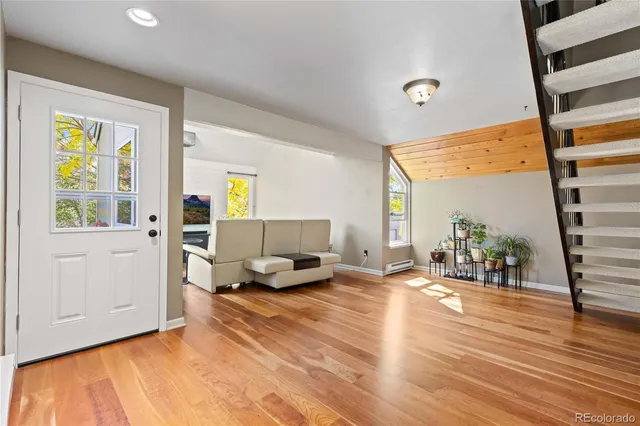 a bedroom with furniture and window