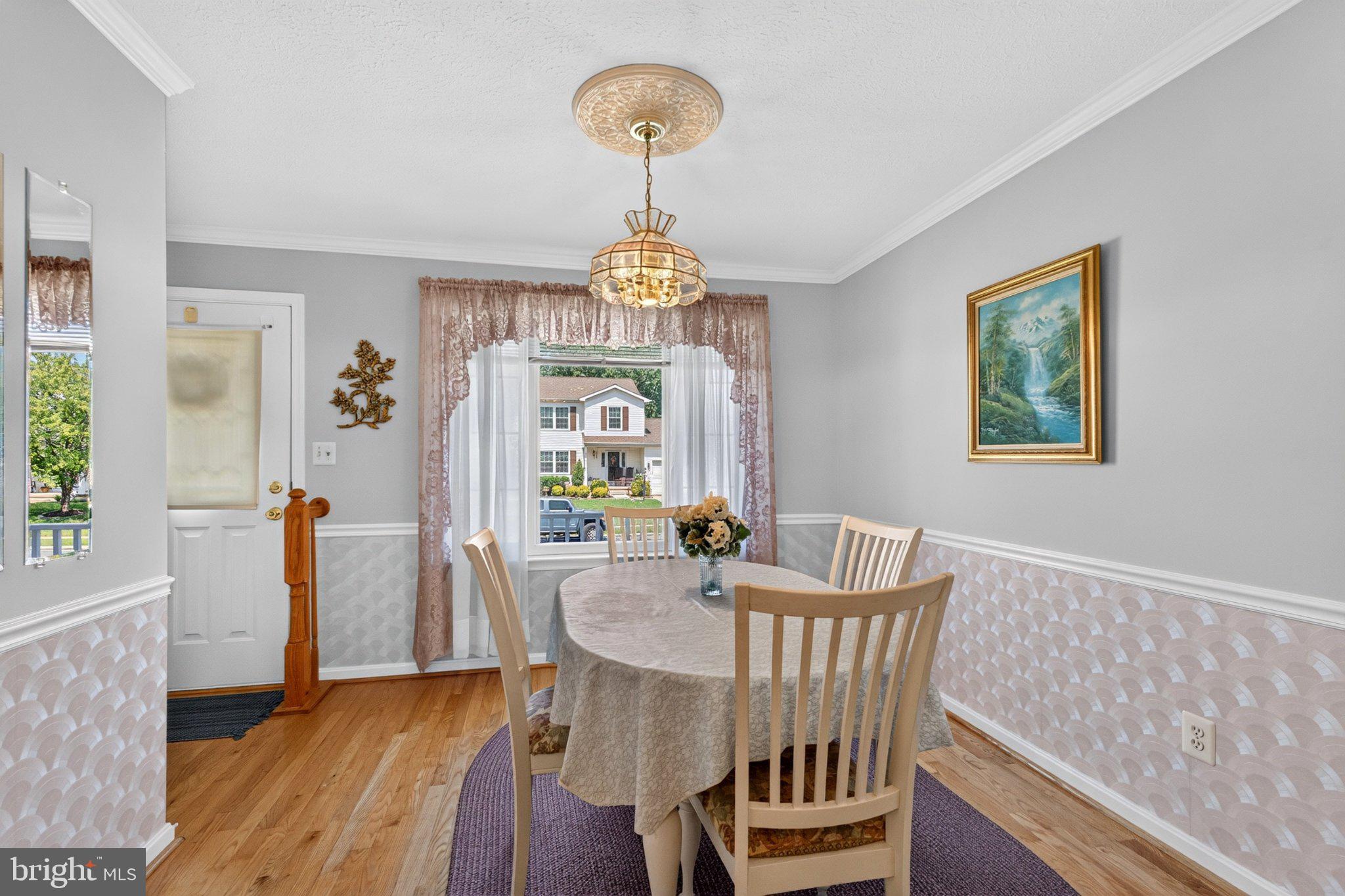 9311 Sea Point Road Baltimore, MD 21219 - Photo 12 of 32 Charming dining space with natural light.