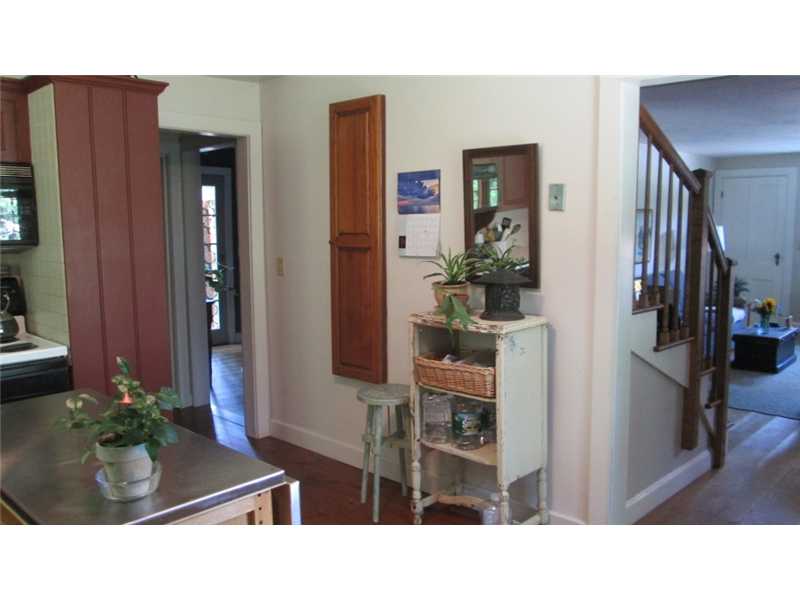 587 Ten Rod Road North Kingstown, RI 02852 - Photo 9 of 20 Kitchen. The charms of an older home..an ironing board in the kitchen!