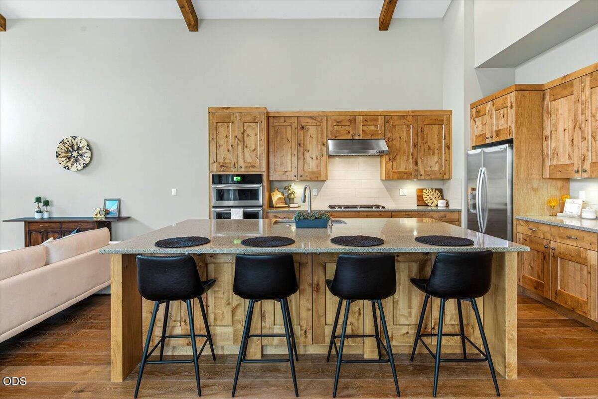 61333 Kindle Rock Loop Bend, OR 97702 - Photo 20 of 53 a view of a dining room with furniture window and wooden floor