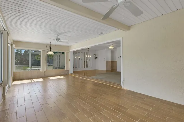a utility room with multiple dryer and washer