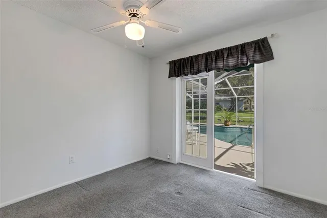 a view of an house with backyard space and garden