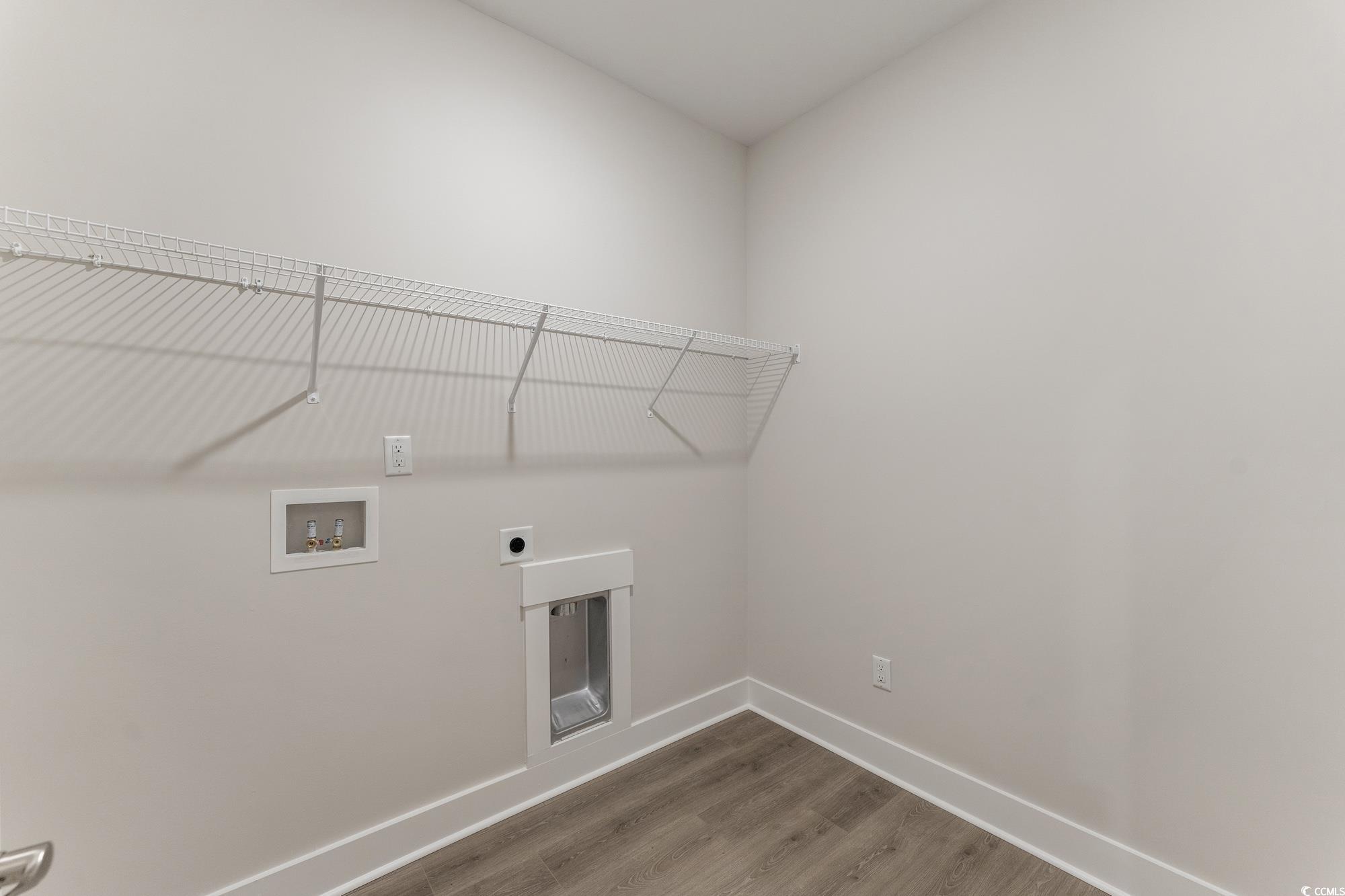 719 Daisy Bank Circle Georgetown, SC 29440 - Photo 18 of 33 Washroom with light wood finished floors, washer hookup, and hookup for an electric dryer