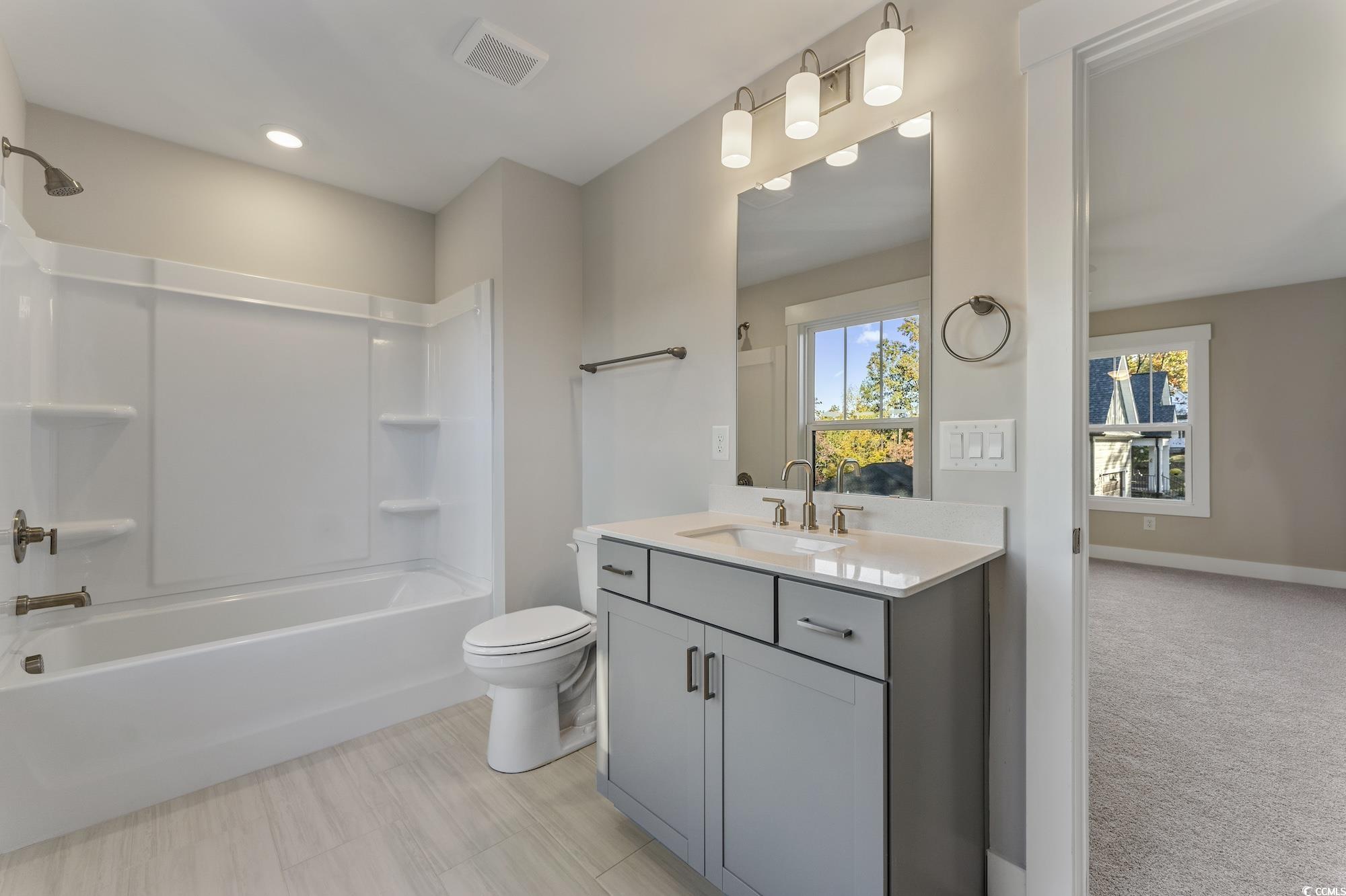 719 Daisy Bank Circle Georgetown, SC 29440 - Photo 28 of 33 Full bathroom featuring vanity and shower / washtub combination