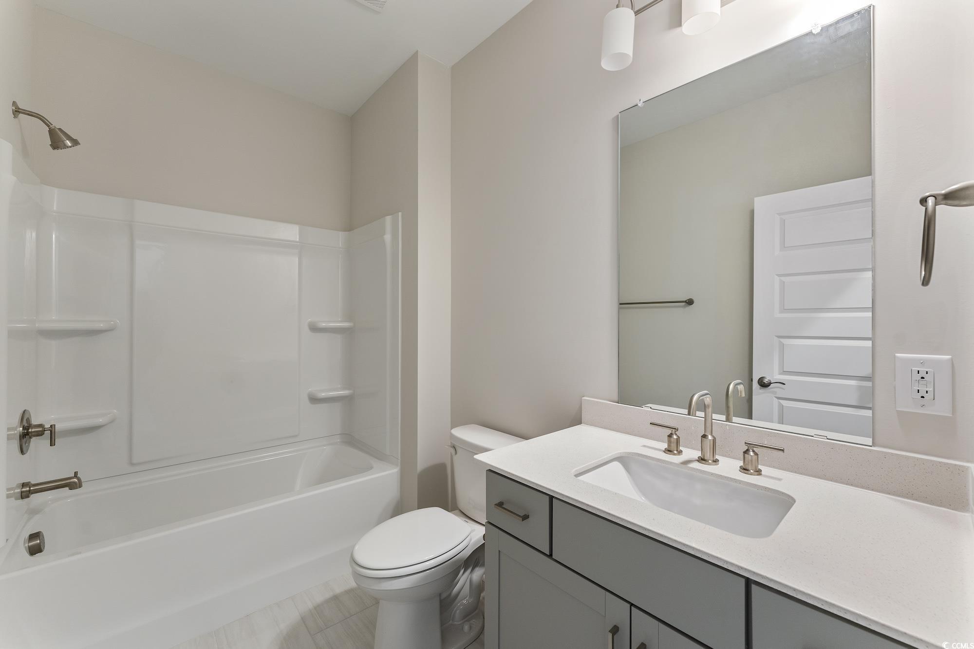 719 Daisy Bank Circle Georgetown, SC 29440 - Photo 31 of 33 Bathroom featuring vanity and shower / washtub combination