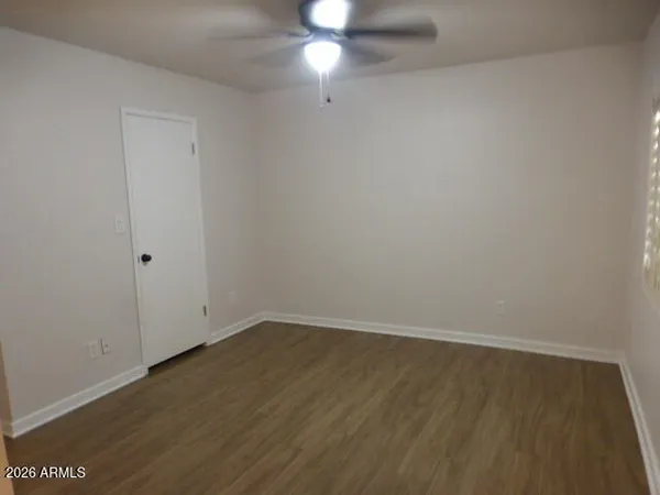 a bathroom with a toilet and a sink