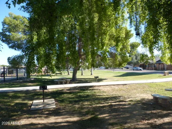 a view of a backyard of the house