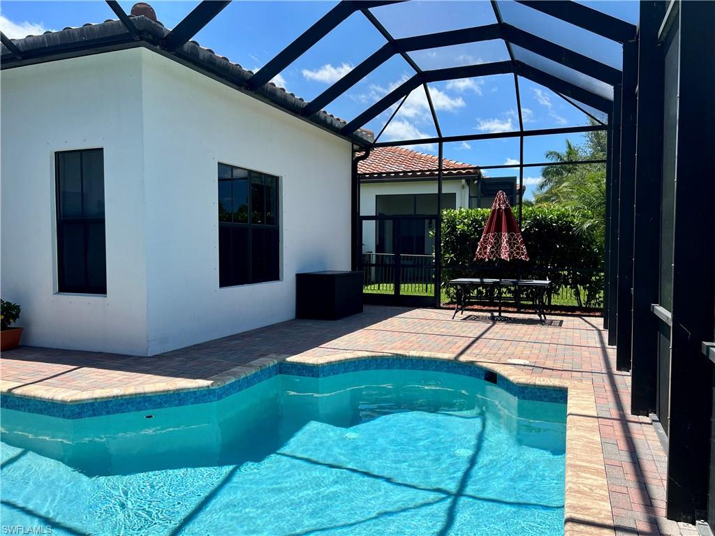 5351 Ferrari Avenue Ave Maria, FL 34142 - Photo 18 of 24 a room with pool and table