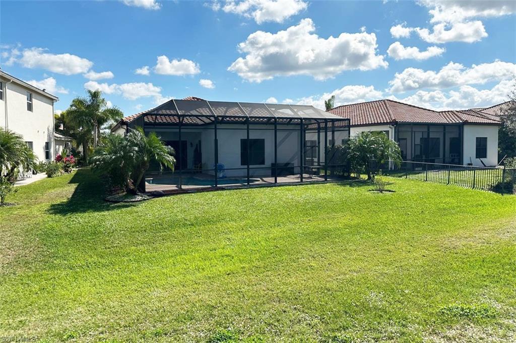 5351 Ferrari Avenue Ave Maria, FL 34142 - Photo 24 of 24 a front view of house with yard and seating area