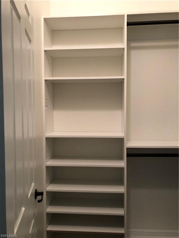5351 Ferrari Avenue Ave Maria, FL 34142 - Photo 10 of 24 a view of walk in closet with empty racks
