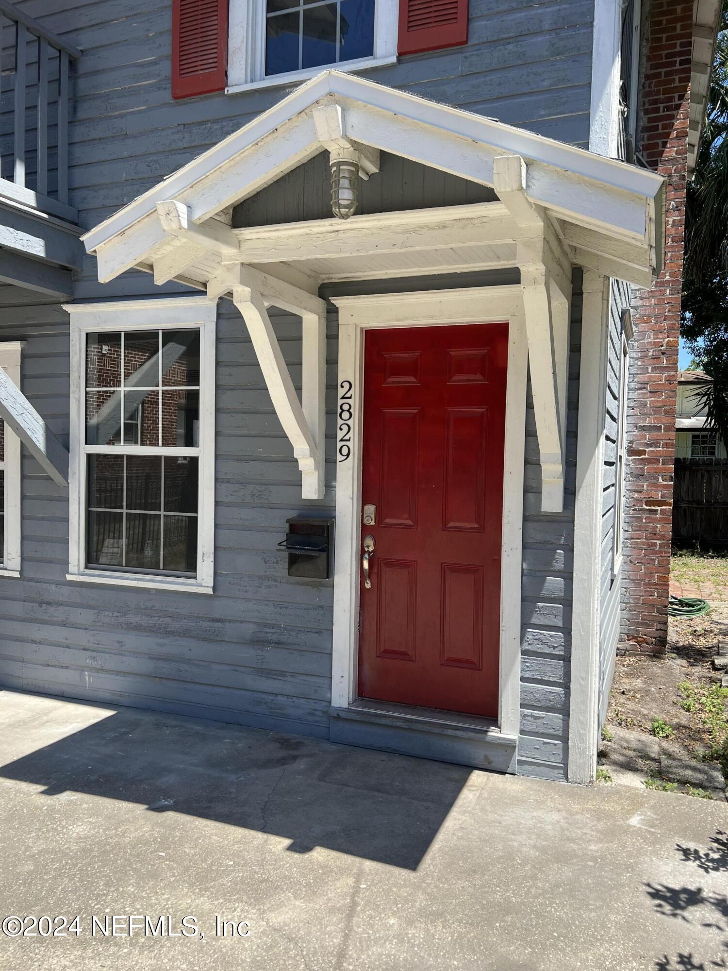 2829 Forbes Street Jacksonville, FL 32205 - Photo 2 of 5 a front view of a house with a yard