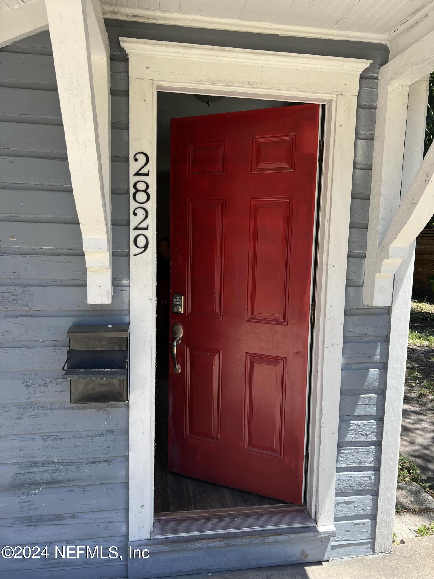 2829 Forbes Street Jacksonville, FL 32205 - Photo 3 of 5 a view of front door with stairs