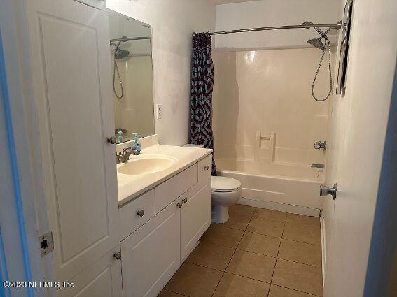 10200 Belle Rive Boulevard, Unit 239 Jacksonville, FL 32256 - Photo 14 of 27 a bathroom with a double vanity sink toilet mirror and shower