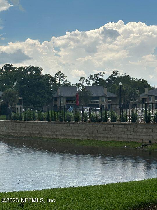 10200 Belle Rive Boulevard, Unit 239 Jacksonville, FL 32256 - Photo 20 of 27 an aerial view of a house with a yard