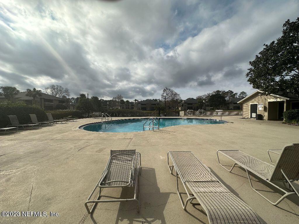 10200 Belle Rive Boulevard, Unit 239 Jacksonville, FL 32256 - Photo 24 of 27 a view of a terrace with sky view
