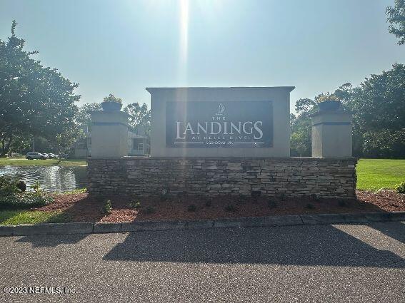 10200 Belle Rive Boulevard, Unit 239 Jacksonville, FL 32256 - Photo 5 of 27 a view of a street with benches