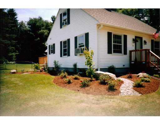 43 Bethany Road Monson, MA 01057 - Photo 6 of 16 a front view of a house with a yard