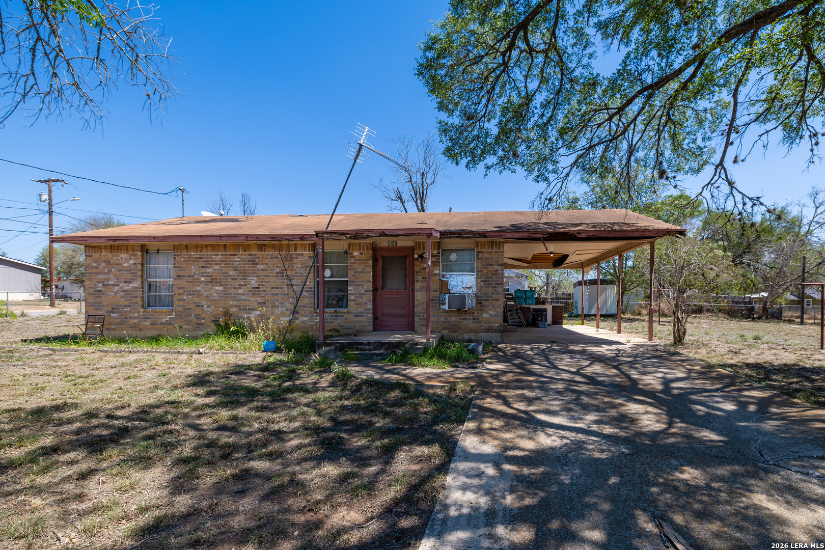 354 6th Poteet, TX 78065 - Photo 1 of 11 a view of a house with a yard