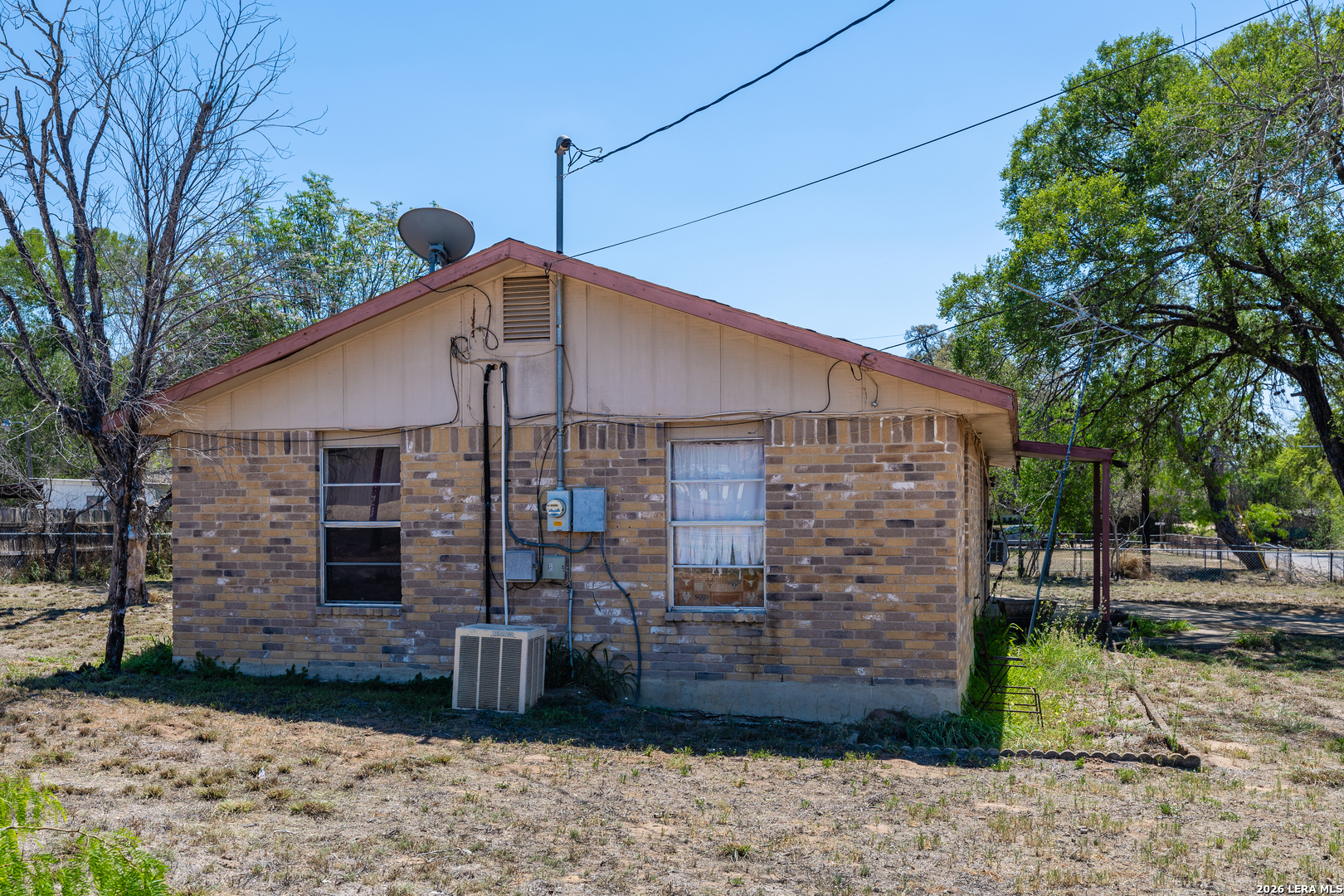 354 6th Poteet, TX 78065 - Photo 3 of 11 a front view of a house