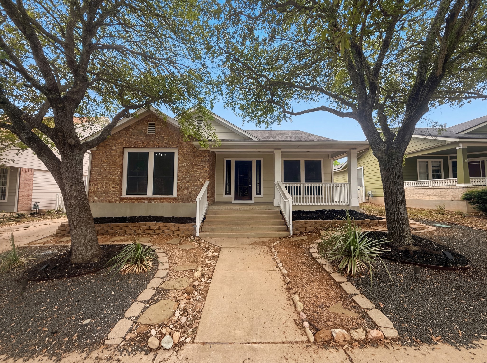 256 Morrell Kyle, TX 78640 - Photo 1 of 1 a front view of a house with a garden