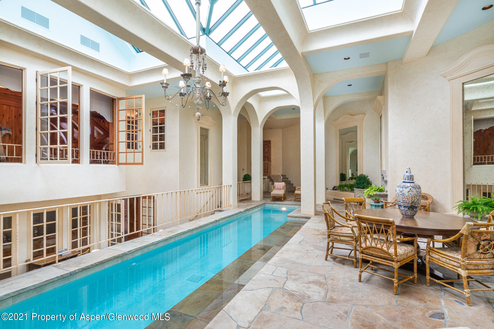 2137 Red Mountain Road Aspen, CO 81612 - Photo 11 of 59 a view of a house with porch and chairs