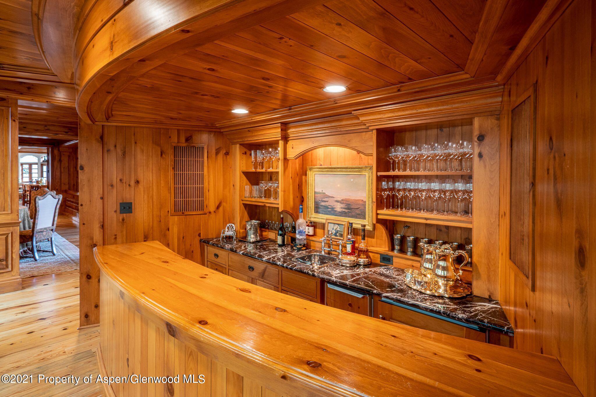 2137 Red Mountain Road Aspen, CO 81612 - Photo 15 of 59 a room with gym equipment and window