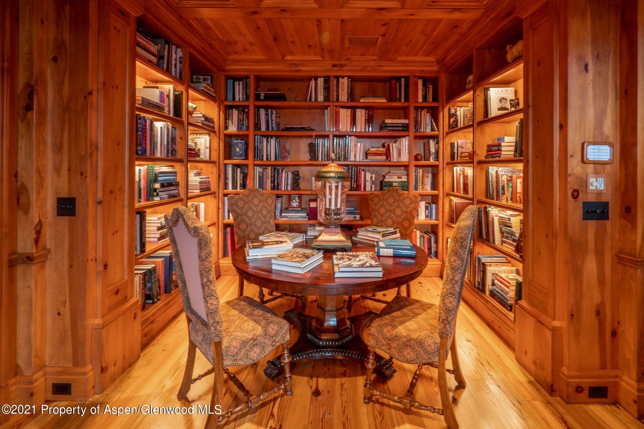 2137 Red Mountain Road Aspen, CO 81612 - Photo 16 of 59 a view of a dining room with furniture and chandelier
