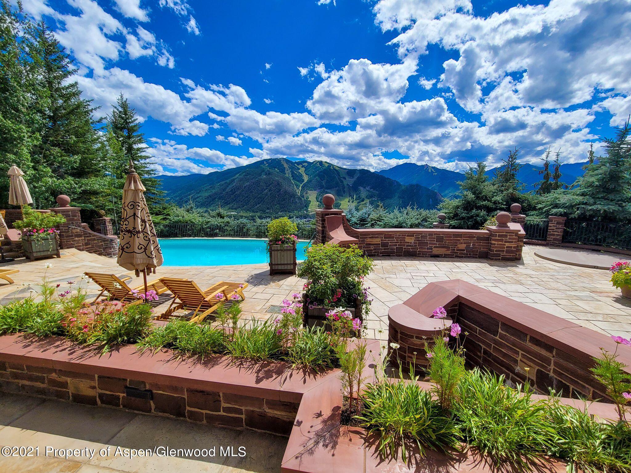 2137 Red Mountain Road Aspen, CO 81612 - Photo 57 of 59 a view of a backyard with sitting area