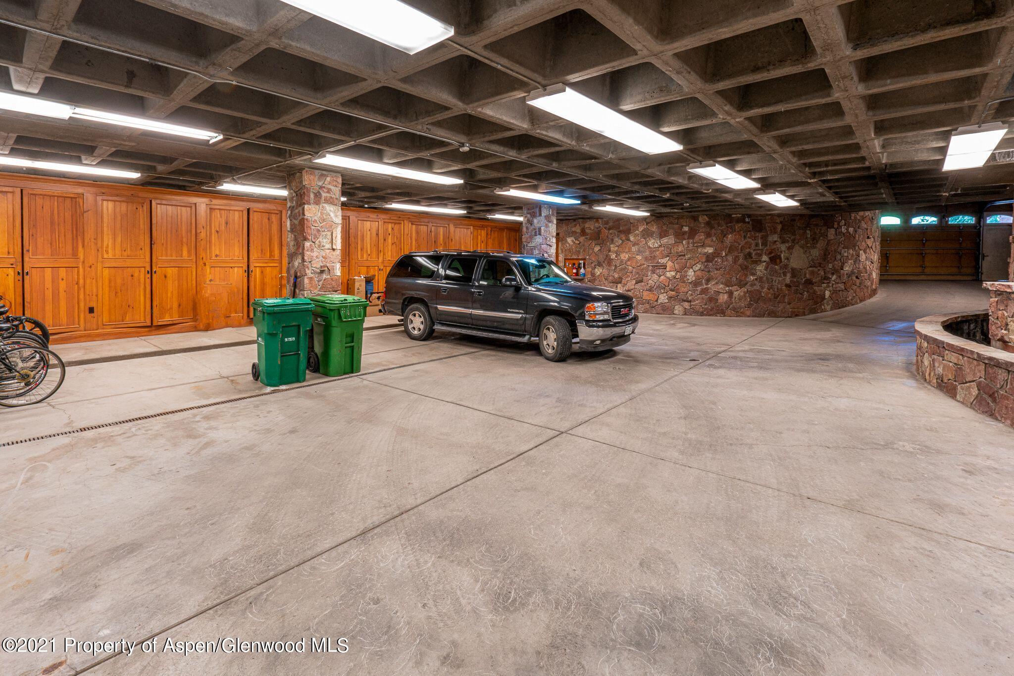 2137 Red Mountain Road Aspen, CO 81612 - Photo 58 of 59 a view of parking garage with cars