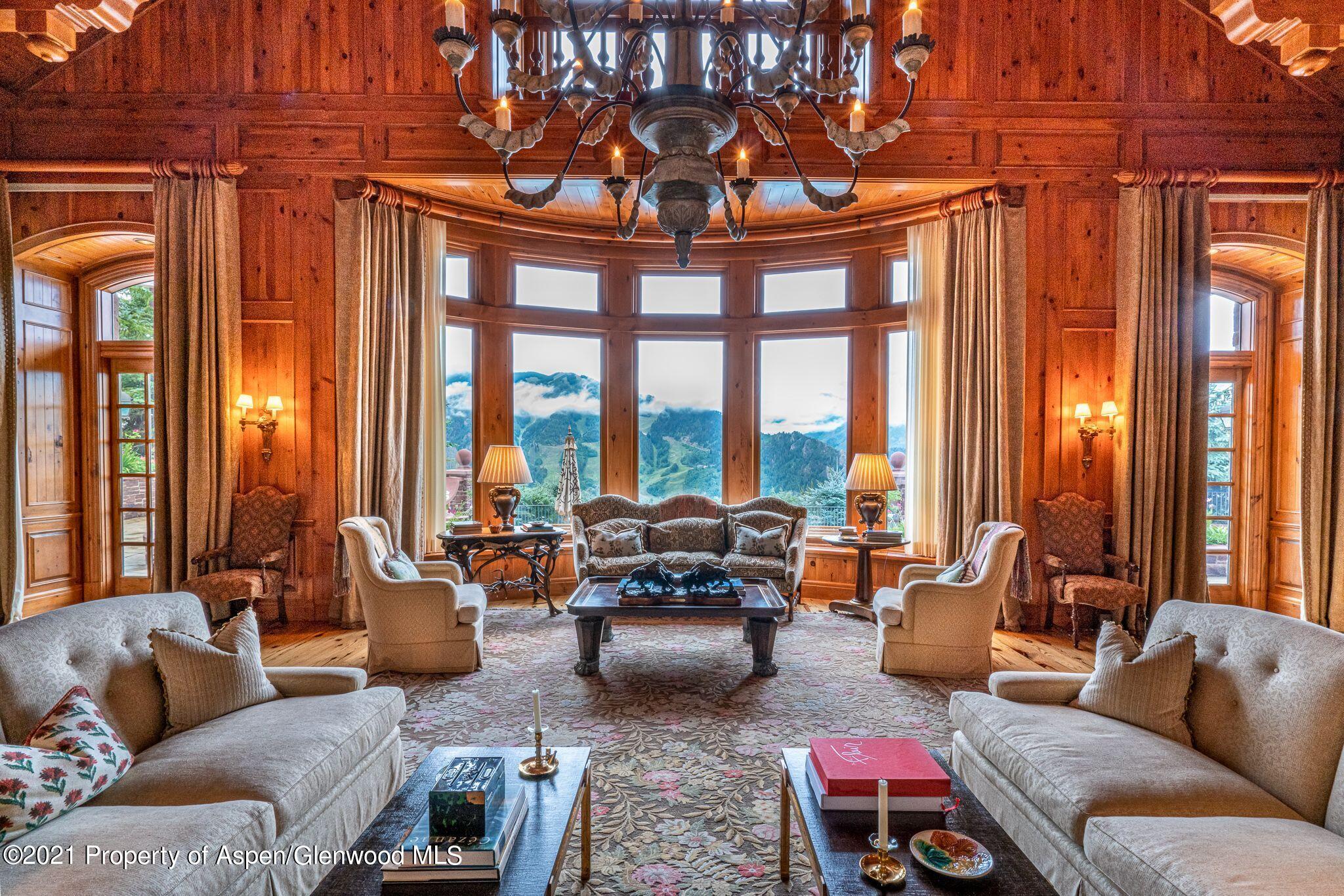 2137 Red Mountain Road Aspen, CO 81612 - Photo 6 of 59 a living room with furniture and large windows