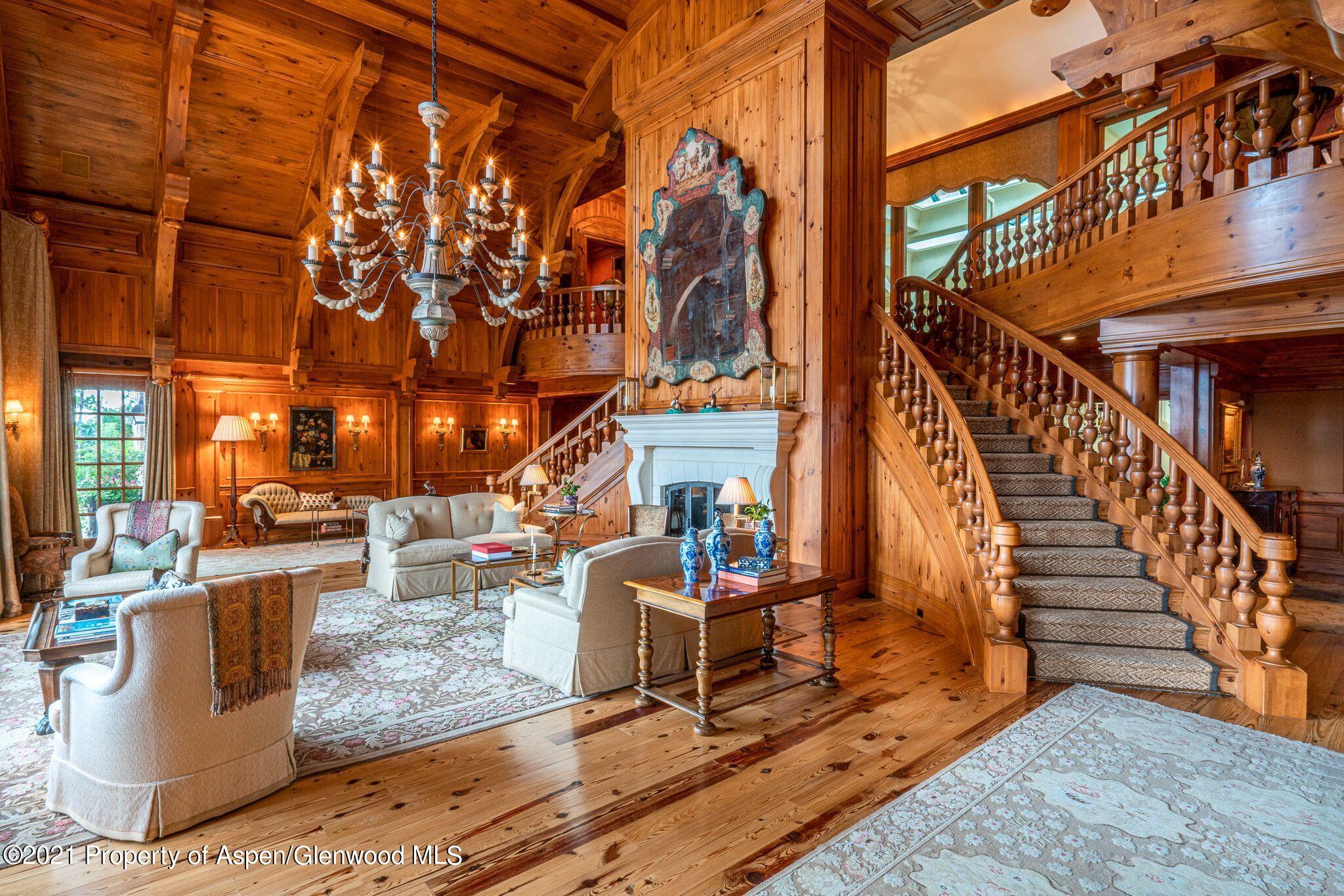 2137 Red Mountain Road Aspen, CO 81612 - Photo 9 of 59 a view of a patio with couches and potted plants
